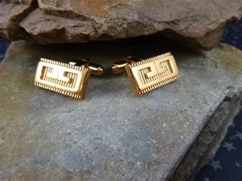 givenchy cufflinks.